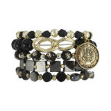 This stack was designed in honor of all of our Local Heroes! This Army Stack displays a variety of black and gold beads and is highlighted with a golden Army charm.