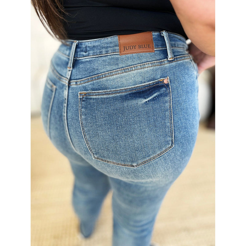 Mid Rise Rigid Magic Release Hem Jeans