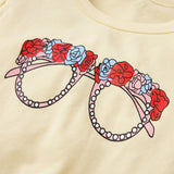 Graphic Tie Hem Top and Floral Flare Pants Set - Spicie's Boutique